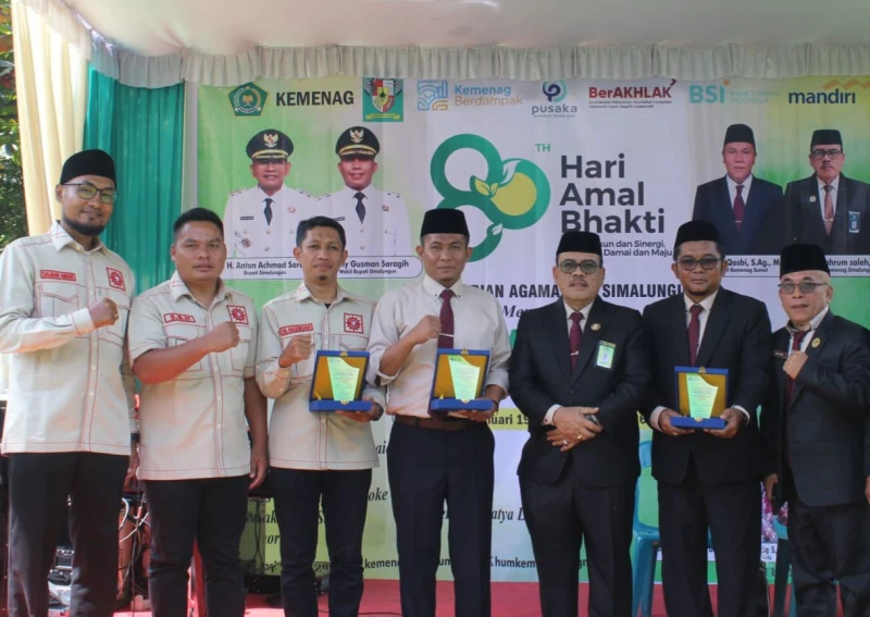 LBH-AP Muhammadiyah Terima Plakat di Resepsi HAB Kemenag Simalungun ke-80. - TajamNews